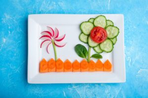 Kids food. Funny vegetable salad for kids. Healthy food with vegetables